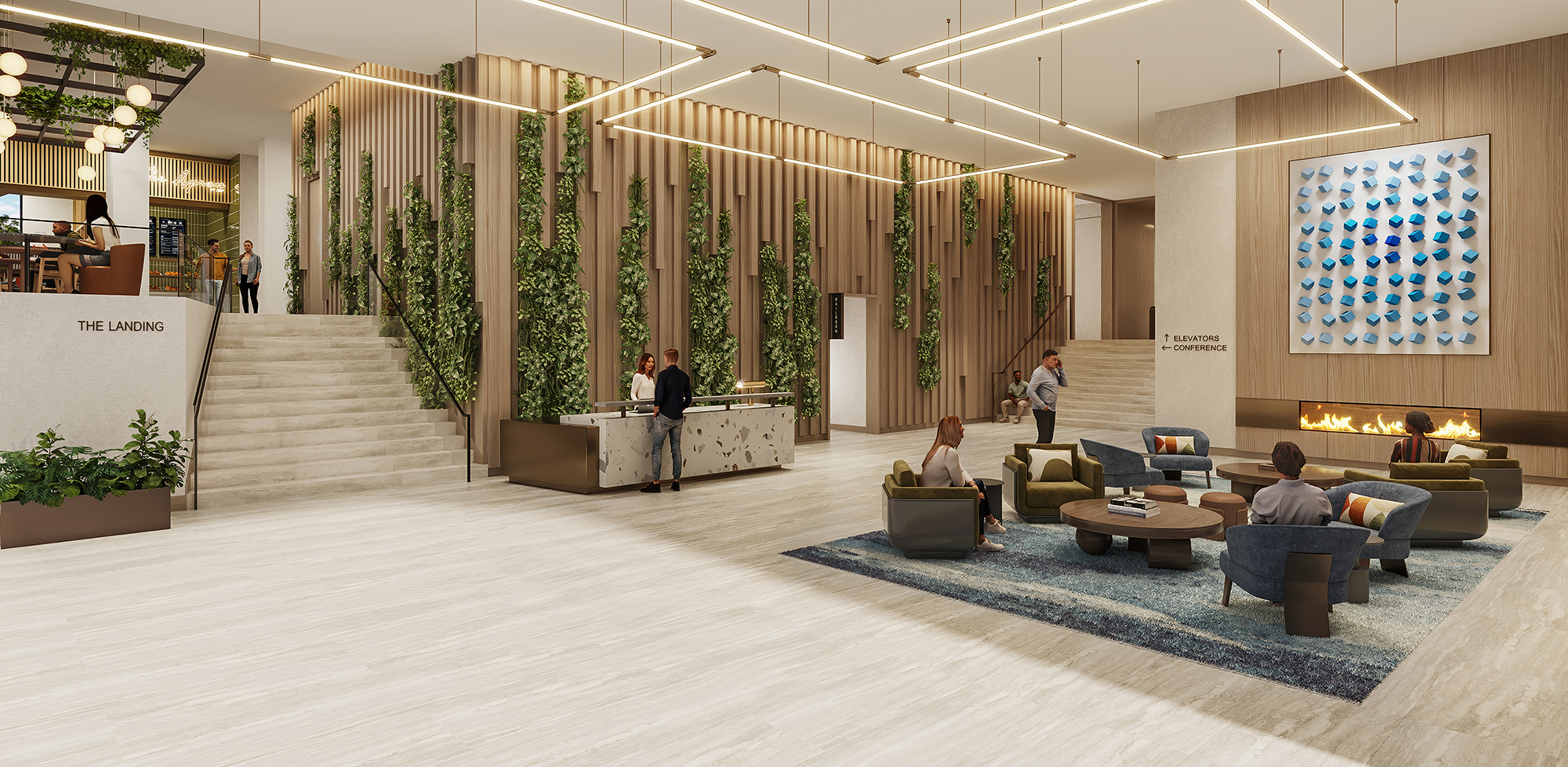 Tenants seated in the lobby of The Landing Burlingame in front of an eco wall