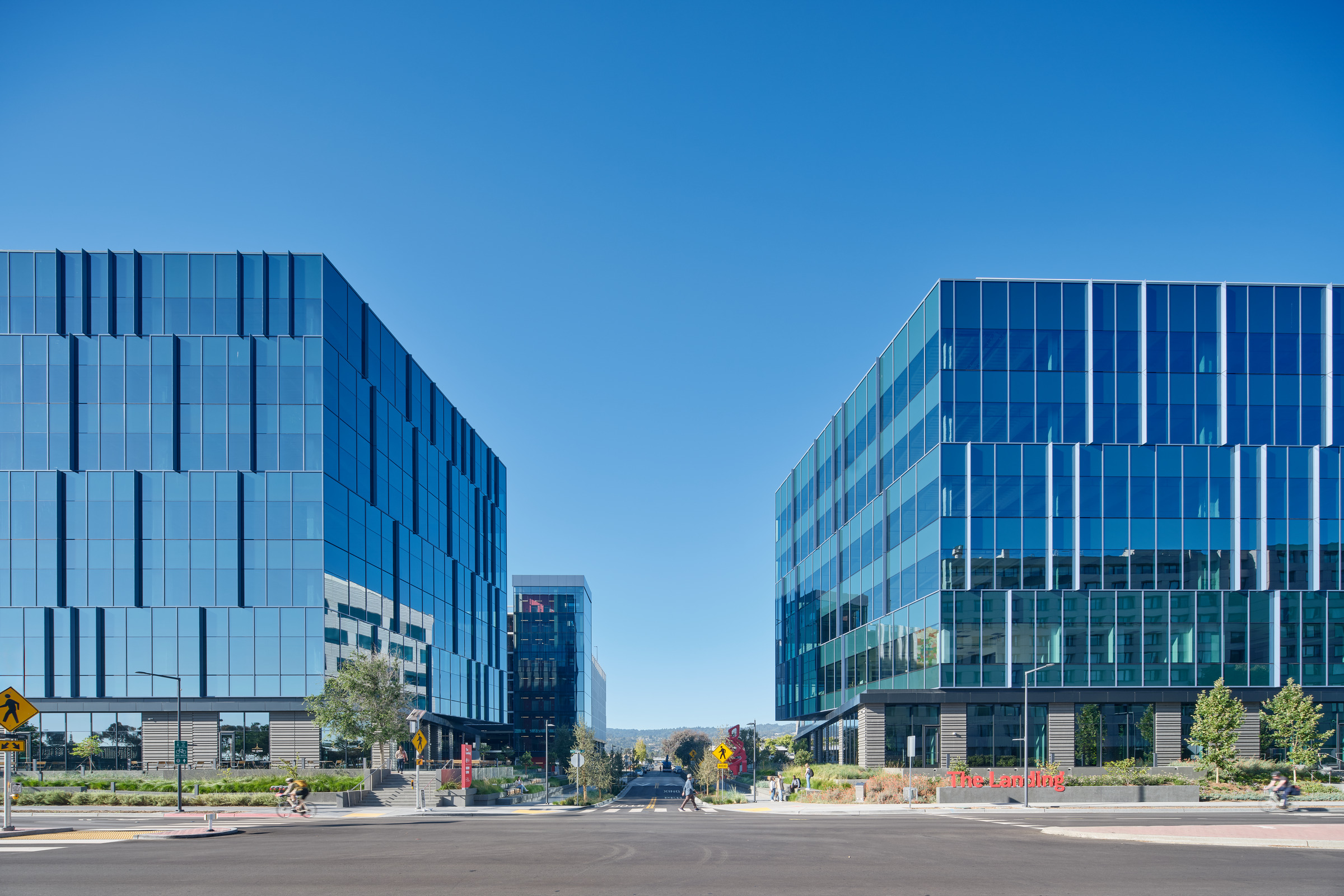 exterior photo of The Landing campus with 2 glass buildings