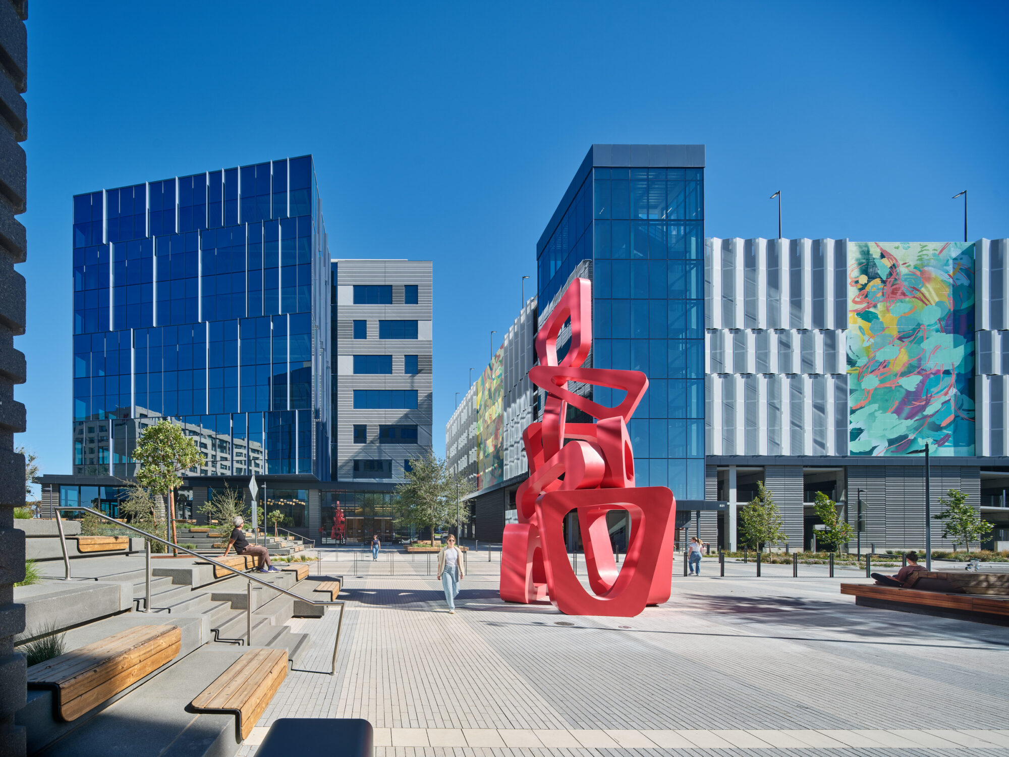 The Landing | plaza with red sculpture