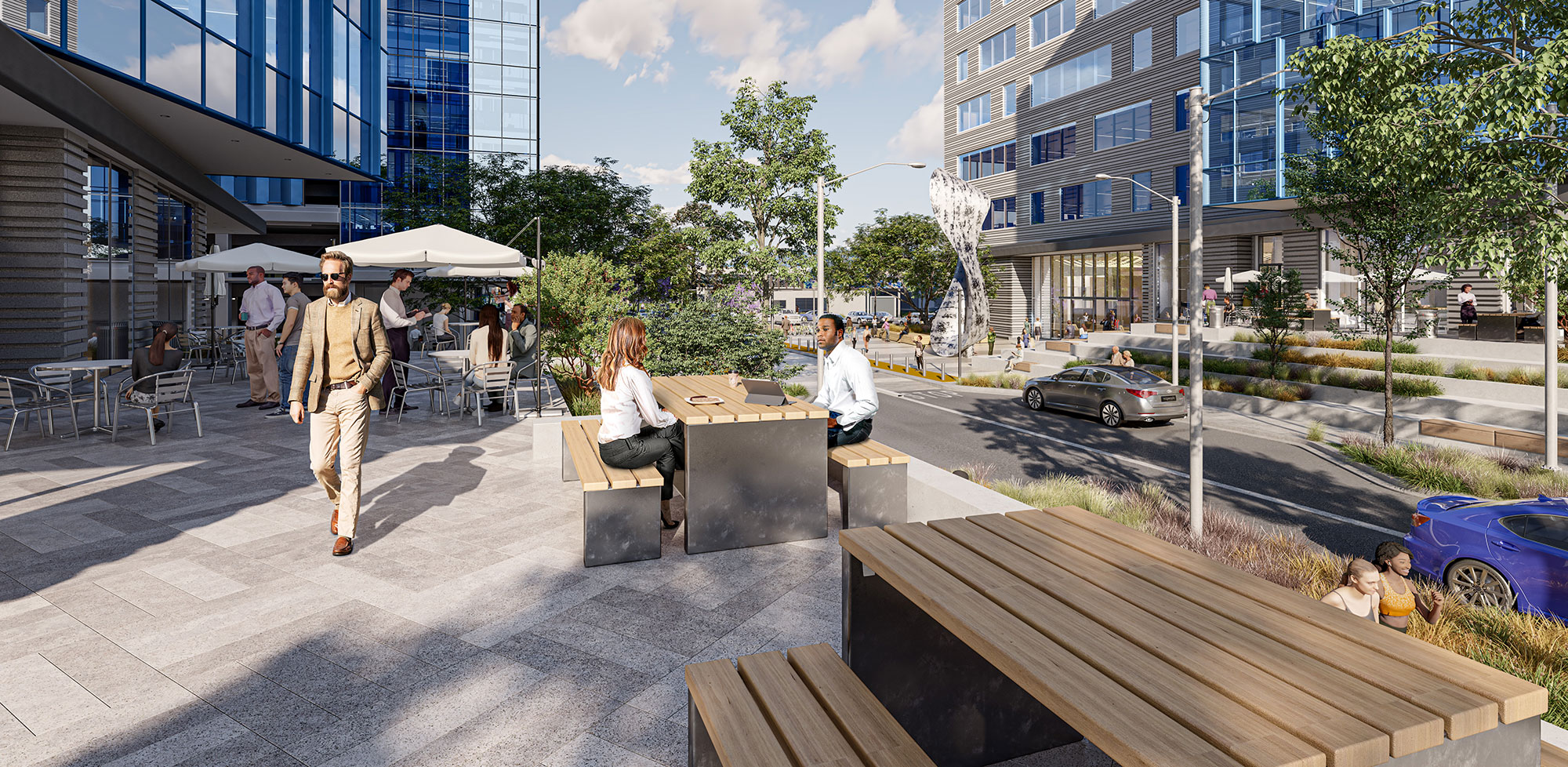 Tenants enjoying fresh air and sunlight in outdoor seating area at The Landing Burlingame